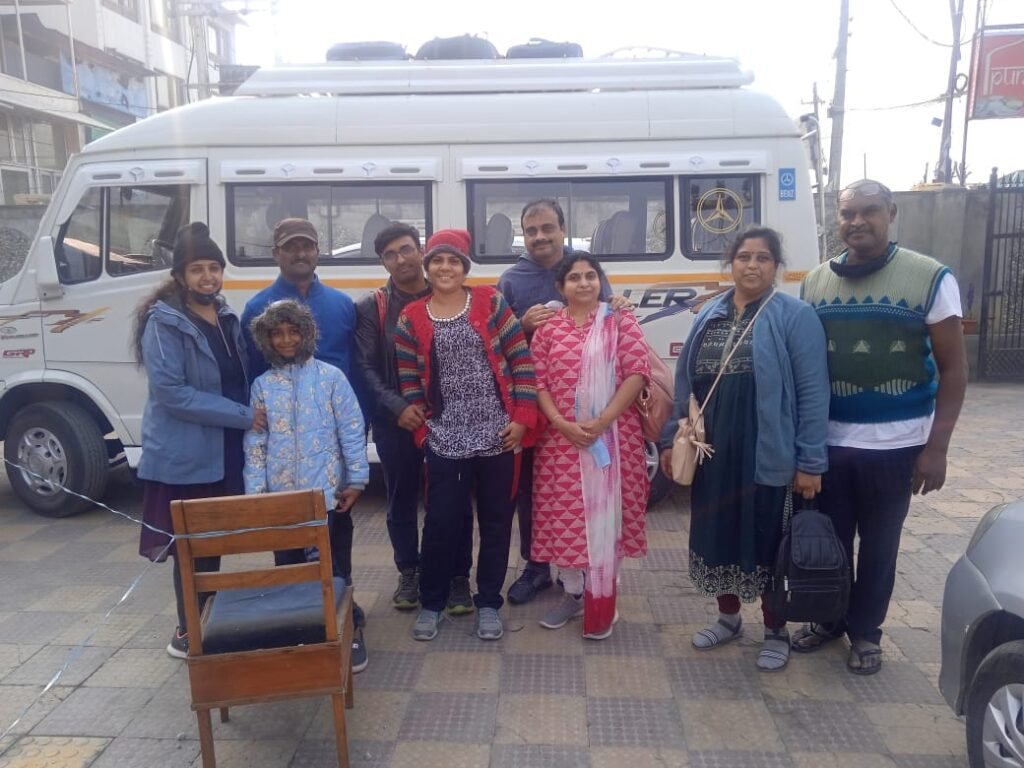 A family on Dal Lake enjoying their trip