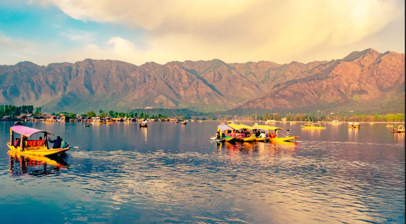 Dal Lake Srinagar with Shikaras and mountains in Kashmir
